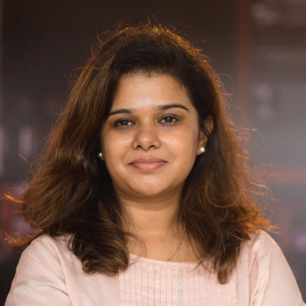 Portrait of Tanya Garg, co-founder and executive director of Jugalbandi Foundation